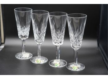 LOT OF 4 WATERFORD CRYSTAL CHAMPAGNE GLASSES, 7IN HEIGHT