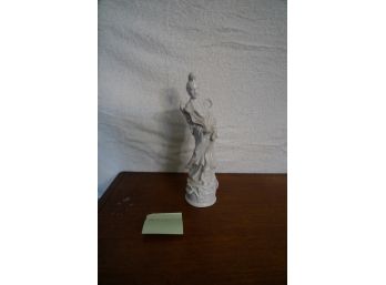WHITE PORCELAIN FIGURINE OF A WOMEN, 12IN HEIGHT