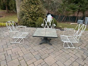Outdoor Table With White Chairs