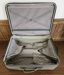Suitcase With Rolling Option