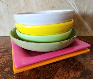 Assortment Of Colorful Plastic Tableware Selections