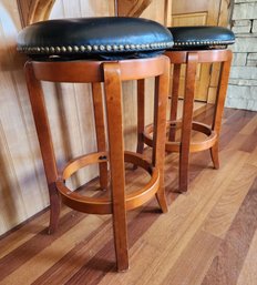 (2) Faux Leather Top Bar Stools With Wooden Legs