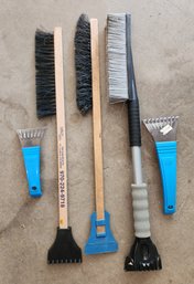 Assortment Of Ice Snow Auto Scrapers And Brushes