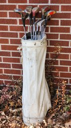 Vintage White Leather Golf Bag With Assortment Of Vintage Wooden And Metal Clubs