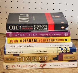 Assortment Of Paperback Books Feat. OIL!