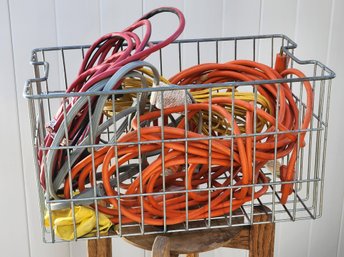 Assortment Of Extension Cords With Wire Basket