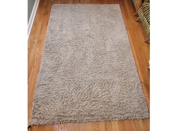Newer Taupe Solo Shag Collection Area Rug