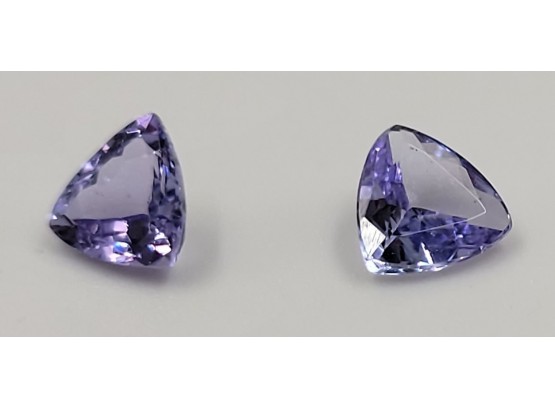 Pair Of Tanzenite 5.5x5.5mm Trillion Cut Gems, Approximately .25 Ct Each