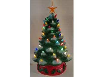 Holly Base Snow Covered Lighted Ceramic Christmas Tree