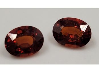 Pair Of Red Spessartitie 8x6mm Oval Cut Gems, Approximately 1.5 Ct Each