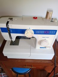 Sewing Machine With Contents