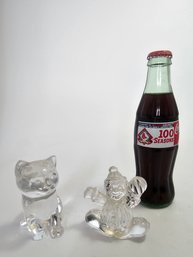 Figurines And A Collectable Coca Cola Bottle