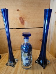 Two Cobalt Blue Vases, Heavy Base, One Bottle Filled With Decorative Pebbles And Glass