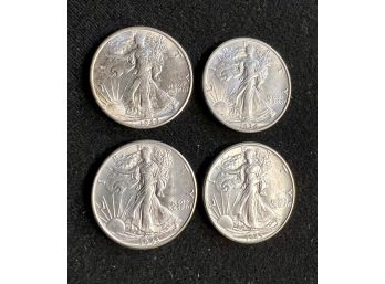 Four Brilliant Uncirculated Walking Liberty Half Dollars, 1934,1943,1944s,1945