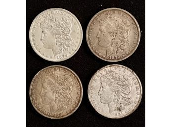 Group Of 4 Morgan Silver Dollars, Various Grades