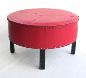 LARGE VINTAGE DRUM-SHAPED STOOL OR BENCH COVERED IN RED IMITATION LEATHER, MID 20TH CENTURY
