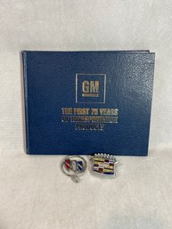 GM Book Of The First 75 Years Of Transportation Products W/ 2 Car Logo Pieces