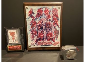Red Wings Stanley Cup Champions Plaque, Chris Chelios # 24 Card Plaque, & Red Wings Tap Measure