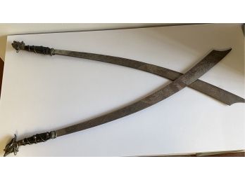 Two Vintage Swords With Detailing