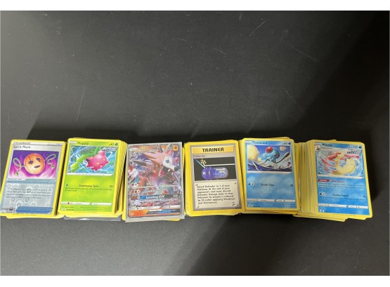 About 300 Basic Pokemon Cards