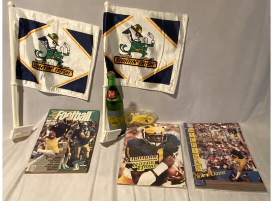 Notre Dame Lot- 2 Flags, 3 Magazines, 1 Bottle Opener, 1 Glass Of 7up