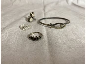 Sterling Silver Bracelet And Three Rings