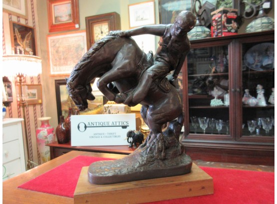 Bronzed Bronco Buster Statue