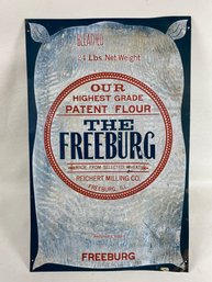 Early 1900s Freeburg Flour Tin Tacker Sign