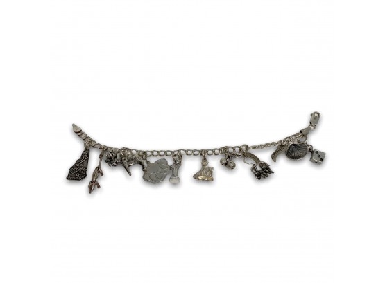Sold at Auction: Sterling Silver Charm Bracelet