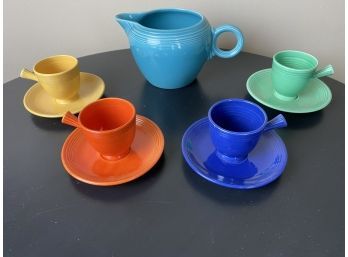 Vintage Fiesta Pitcher And Four Demitasse Cups With Saucers