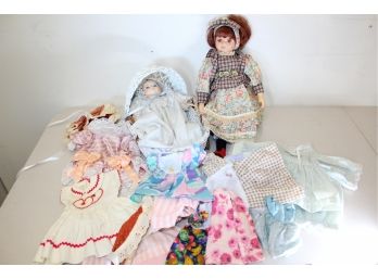 Pair Of Vintage Dolls With Clothing