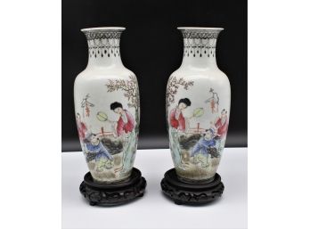 Pair Of Asian Vases With Opposite Scenes