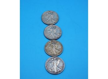 Four 1941 Silver Walking Liberty Dollars