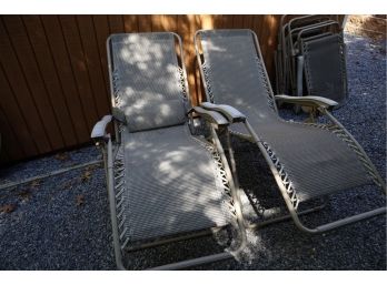 Pair Of Tan Gravity Chairs