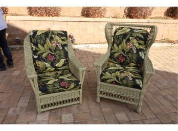 PAIR OF RATTAN CHAIRS WITH FLORAL CUSHIONS