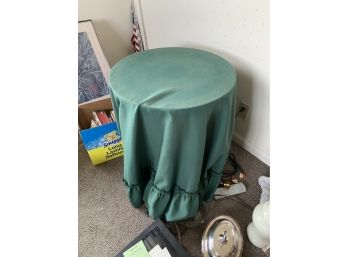 Round Accent Table With Green Tablecloth