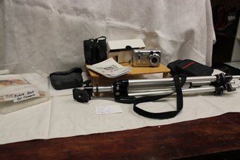 Camera, Tripod And Binoculars