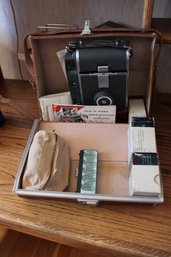 Leather Case With Vintage Polaroid Land Camera
