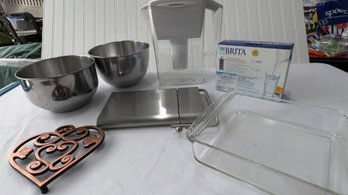 Assorted Housewares Incl. Brita Pitcher & Filters, Copper Trivet. Cheese Slicer & Mixing Bowls