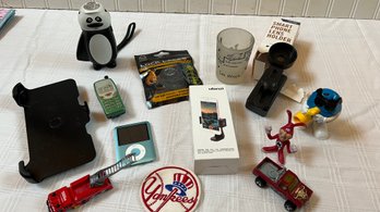 Vintage IPod, Mobile Phone Accessories, Yankees Patch, Flashlight And Other Collectibles