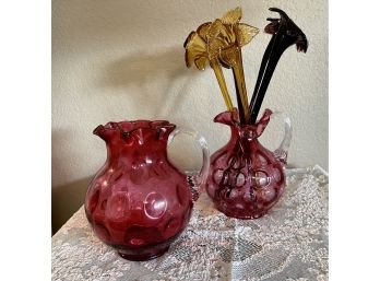 (2) Fenton Cranberry Coin Dot Handled Vases And (5) Blow Glass Flowers (3) Purple & (2) Gold
