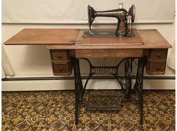 Antique Treadle-operated Singer Sewing Machine With Sewing Contents