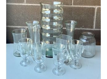 Assorted Lot Of Glassware Including Vases, And Coffee Mugs