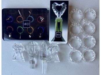 Bar Lot Including Glass Stoppers, Stemware Charms, And Plastic Napkin Rings