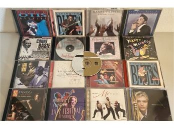 Assorted CDs Including Louis Armstrong, Ray Charles, Jackie Wilson, Ramsey Lewis, Sarah Vaughan, & More