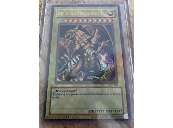 Yugioh Card 'The Winged Dragon Of Ra' GB1-003 In Hard Plastic Sleeve