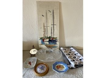 Eclectic Lot Including A Sailing Cross Stitch, Hand Painted Plaques, A Old Navy Scarf, Avon Cake Plate W Box