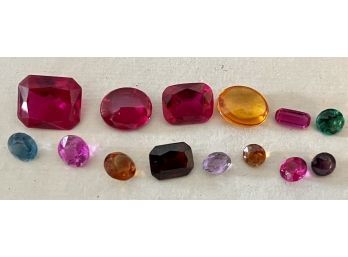 40 Carats Total Of Assorted Gemstones Flame Fusion Rubies, Amethyst, Topaz And More