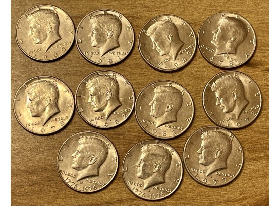 (11) Kennedy Silver Half Dollar Coins, (2) Bicentennial, 1977, (3) 1978, 1980, 1981, 1982, (2) 1983
