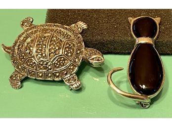 (2) Sterling Silver Pins, (1) Black Onyx Cat & (1) Marcasite & 925 Turtle